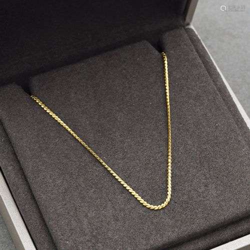 Collier en or jaune 18K 750 millièmes à maille forçat, fermo...