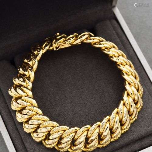 Bracelet en or jaune 18K 750 millièmes à maille ovale partie...