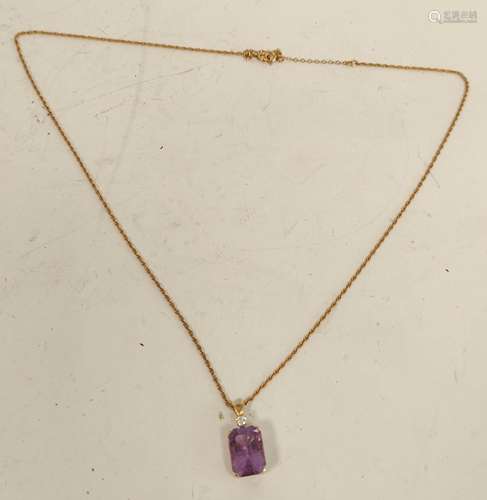 Gold pendant with rectangular amethyst and diamond, probably...