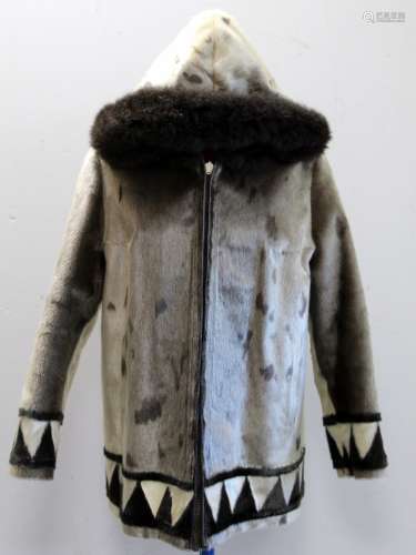 Lady's sealskin jacket with single zip fastening, hood with ...