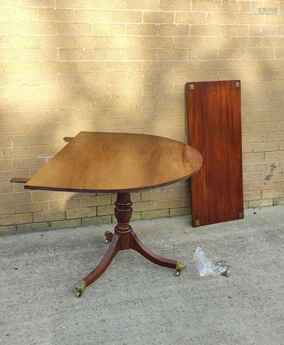 Regency style mahogany snap action twin pedestal dining tabl...