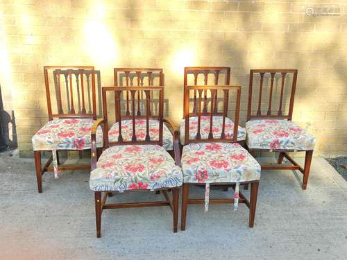 Set of fourteen mahogany dining chairs, comprising of twelve...