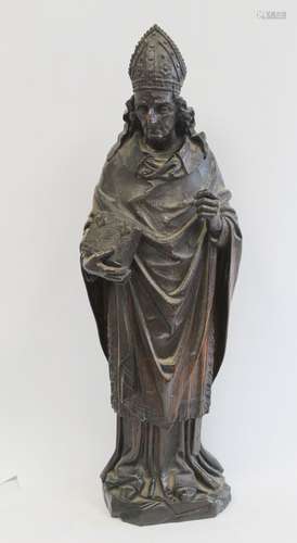 Antique carved oak figure of a bishop holding a book, 56cm h...