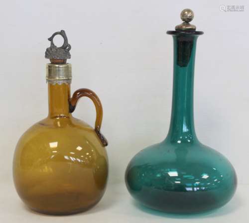Early 19th century amber glass decanter of globe and shaft f...