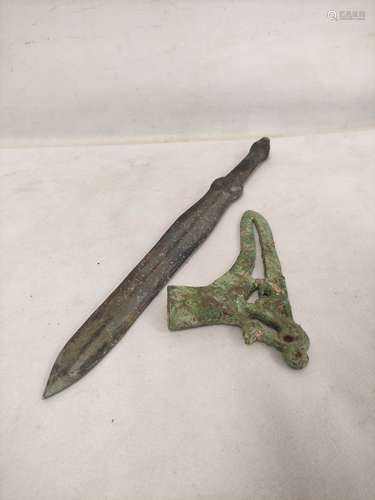 Chinese bronze halberd with pierced decoration and verdigris...