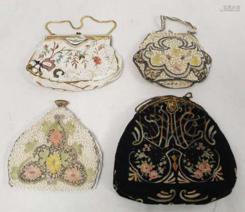 Four vintage lady's beaded and embroidered evening bags.
