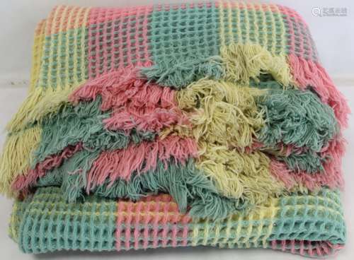 Welsh wool waffle blanket woven in pastel pink, yellow and g...