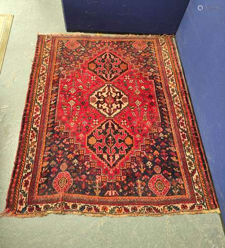 Hamadan rug decorated with three geometric medallions, surro...