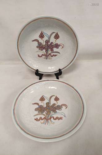 Pair of Chinese Yuan style white glazed dishes with moulded ...