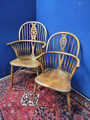 Pair of near matching ash and elm Windsor armchairs, both wi...