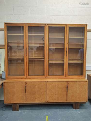 Retro walnut, burr elm and laburnum bookcase, designed by Go...