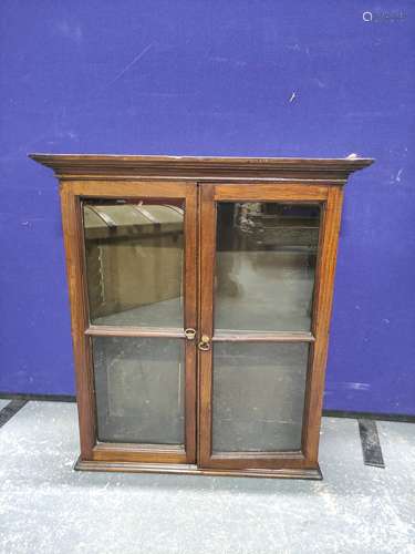 Oak glazed two door wall cabinet