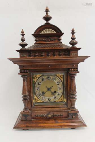 Junghams mantel clock with silvered and ivory dial, in walnu...