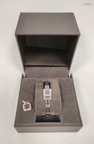 Gucci lady's evening watch, boxed, a pink spinel and diamond...