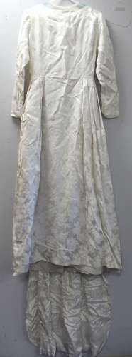 Vintage wedding dress, probably 1960's, in white floral sati...