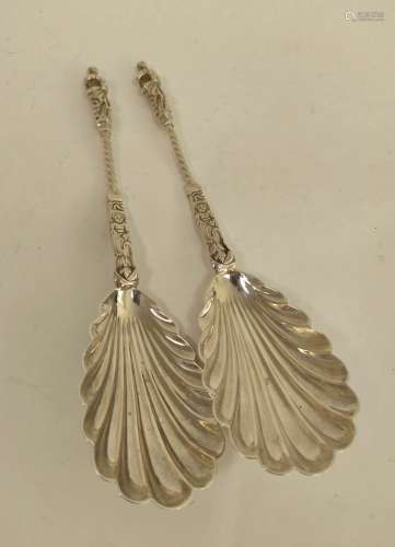 Pair of silver salad serving spoons with scallop bowls and f...