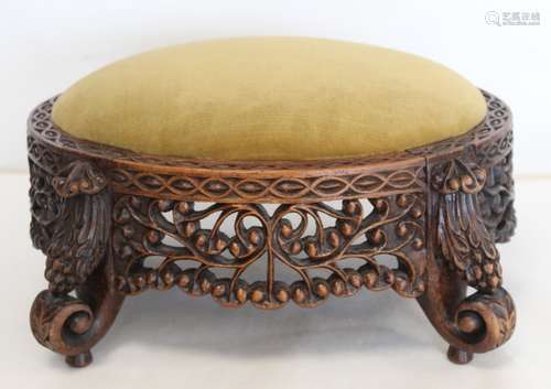 Eastern pierced and carved hardwood footstool of oval form w...