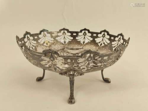 Silver circular fruit bowl with pierced border on scroll sup...
