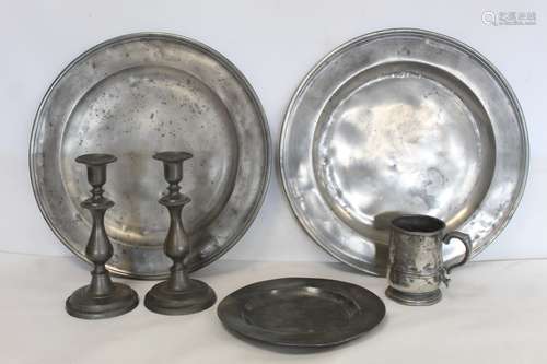 Two large circular pewter chargers, each 42cm diam., with st...