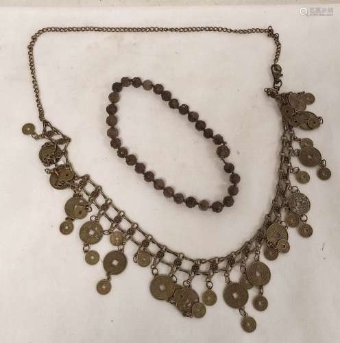 Long Chinese metal 'coin' necklace and a short Chinese neckl...