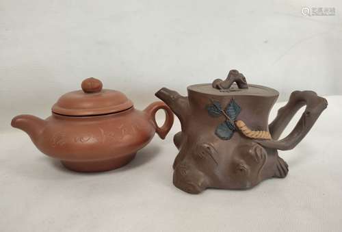 Two Chinese Yixing red clay teapots, one modelled as a tree ...