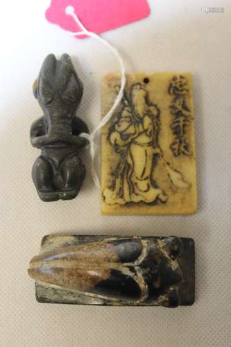 Three Chinese archaic and archaised jade carvings to include...