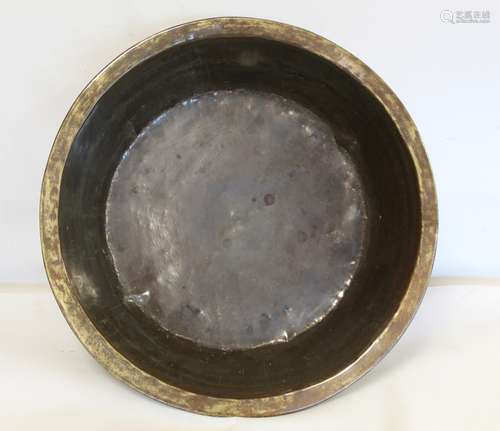 Large 19th century brass bowl of circular form, 61cm diam.