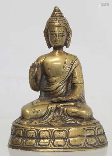 Eastern bronze figure of a Buddha seated on a lotus throne, ...