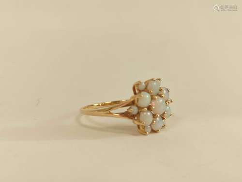 Opal cluster ring in 9ct gold. Size 'R½'.