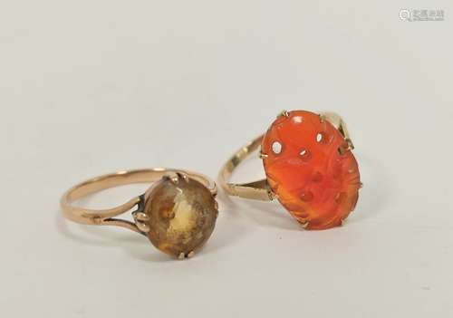 Citrine ring in gold '9ct' and another with carved carnelian...