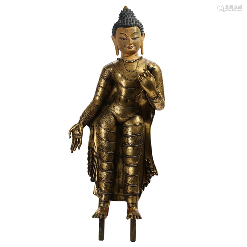 A GILT-BRONZE FIGURE OF SHAKYAMUNI