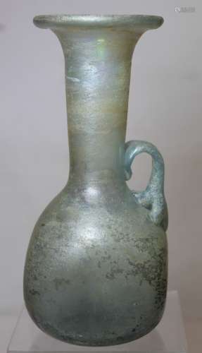 Antique glass flask or ewer, possibly Roman, the flattened g...