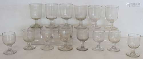 Collection of fourteen antique drinking glasses with rounded...