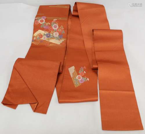 Japanese Obi sash of orange silk with brocade small panels o...