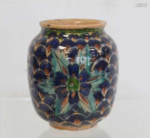 Small Iznik pottery vase of ovoid form decorated in blues, g...