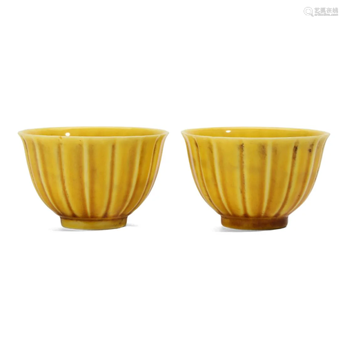 A PAIR OF YELLOW-GLAZED CUPS