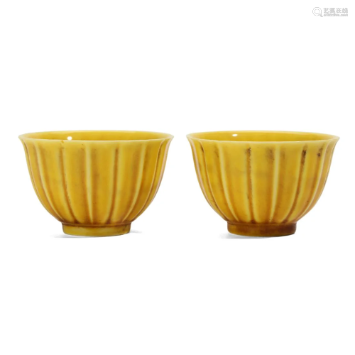 A PAIR OF YELLOW-GLAZED CUPS