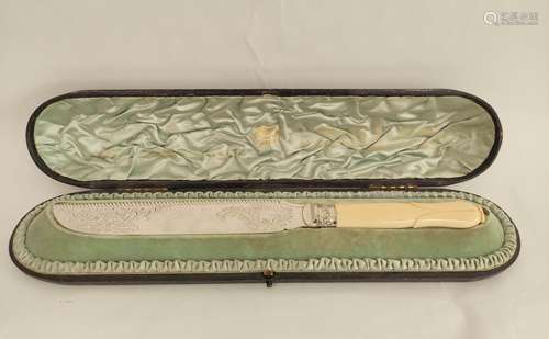 Good e.p. cake knife, engraved with carved ivory handle, the...