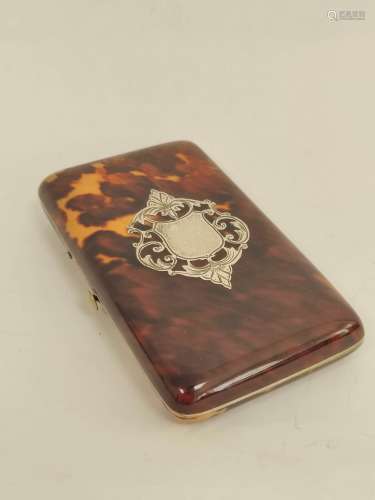 Victorian tortoiseshell card case with inlaid silver shield.