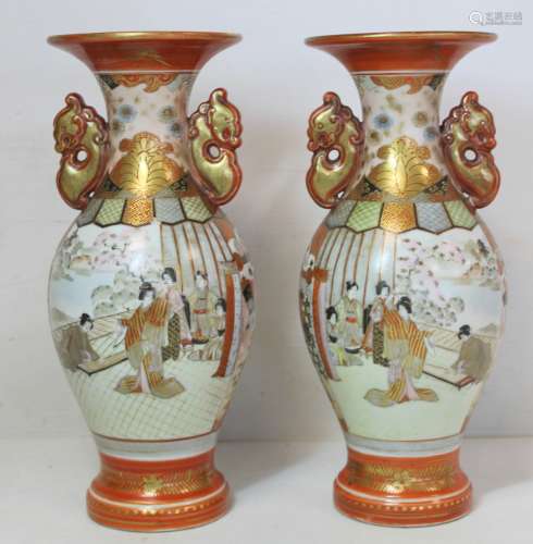 Pair of Japanese Meiji period Kutani vases of twin handled b...