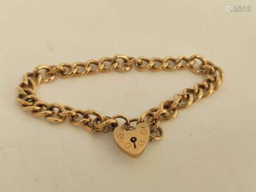 9ct gold curb bracelet with padlock. 23g.