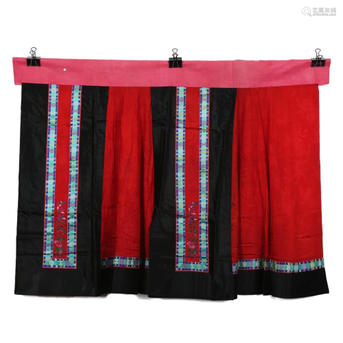 A RED-GROUND EMBROIDERED LADY'S SKIRT