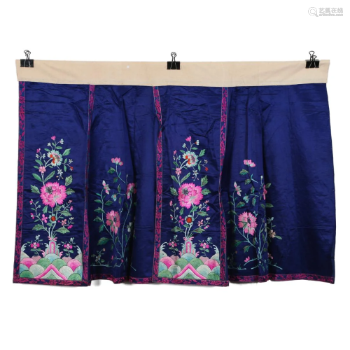 A BLUE-GROUND EMBROIDERED FLORAL LADY'S SKIRT