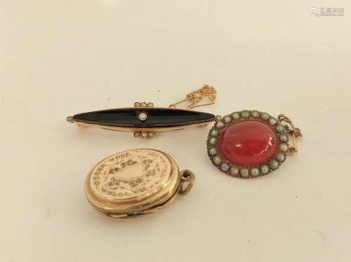 Georgian carnelian and pearl brooch, a mourning brooch and a...