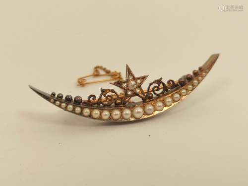 Victorian gold crescent brooch with graduated pearls and dia...