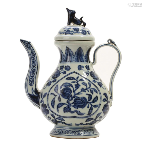 A BLUE AND WHITE 'LOTUS SCROLLS' EWER