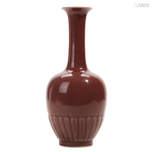 A RED-GLAZED VASE