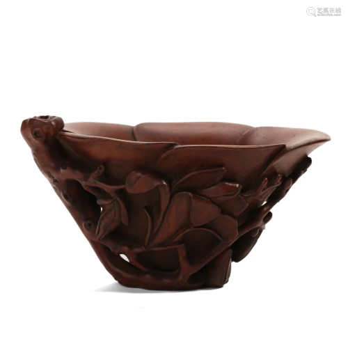 A WOOD CARVED CUP