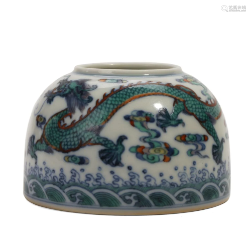 A FAMILLE-ROSE 'DRAGON AND WAVES' JAR