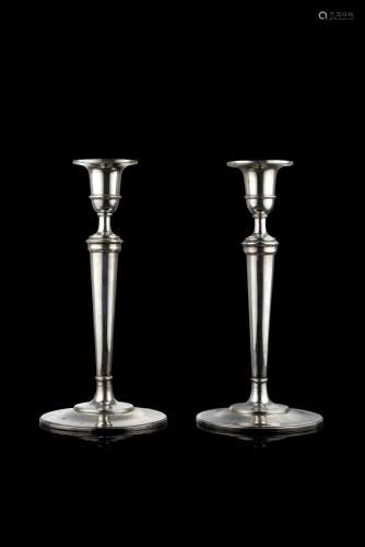 A 19th-century Milanese pair of silver candelabras. Signed M...